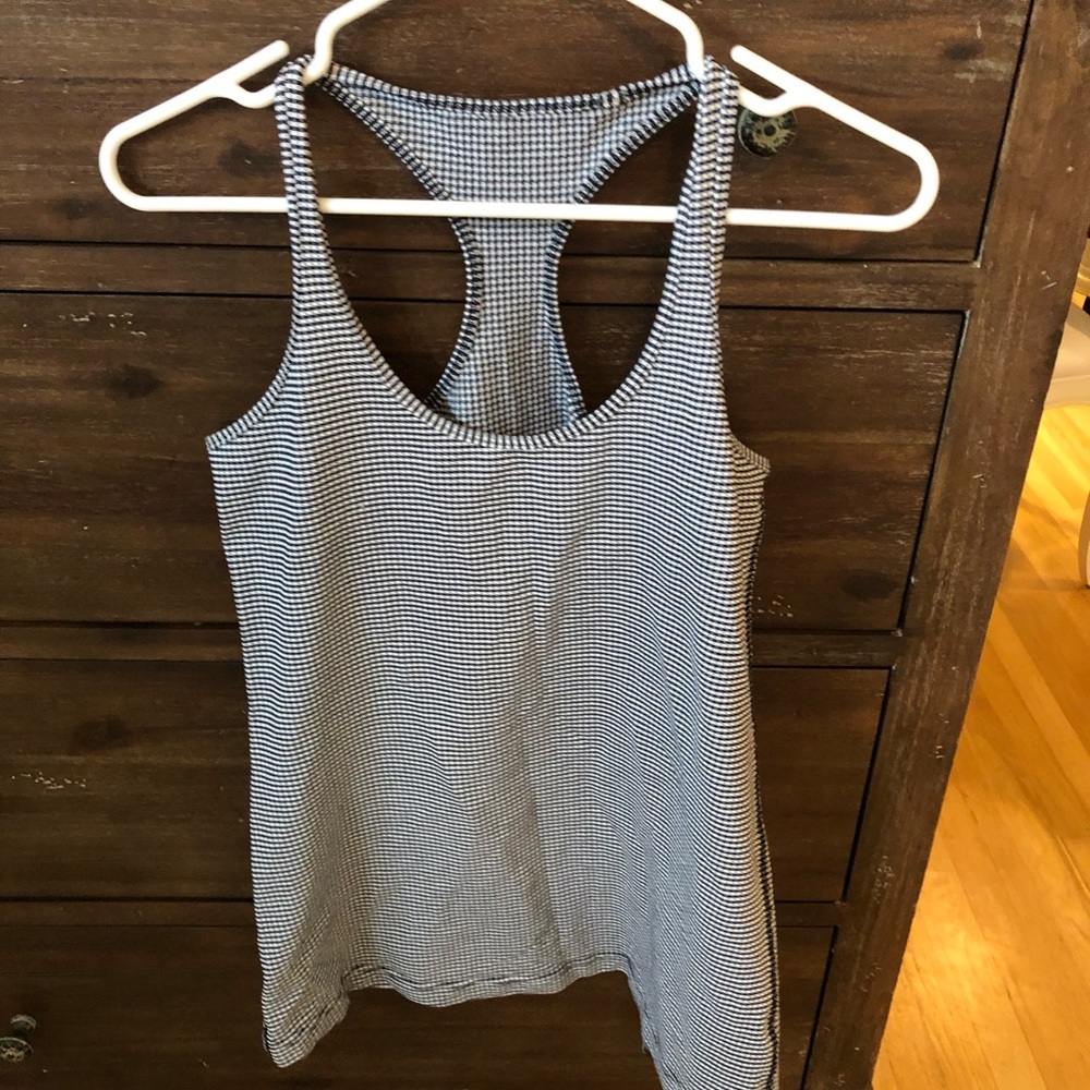 Size 8 lulu lemon tank top. Great condition
